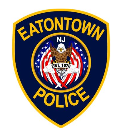 EatonTown Police logo: “EATONTOWN POLICE” with a “NJ” badge and an eagle over a patriotic shield, “EST. 1670”.